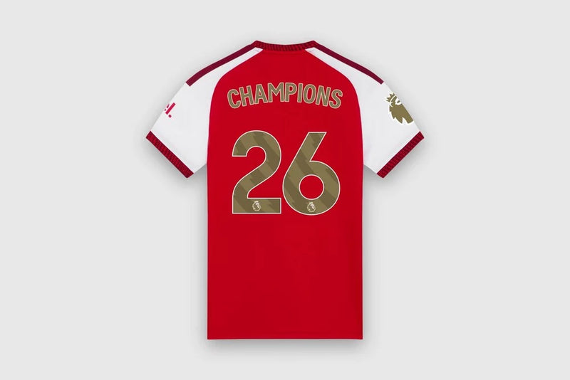 Camisa Arsenal Home Feminina Versão Jogador 26/27 Premier League Champions